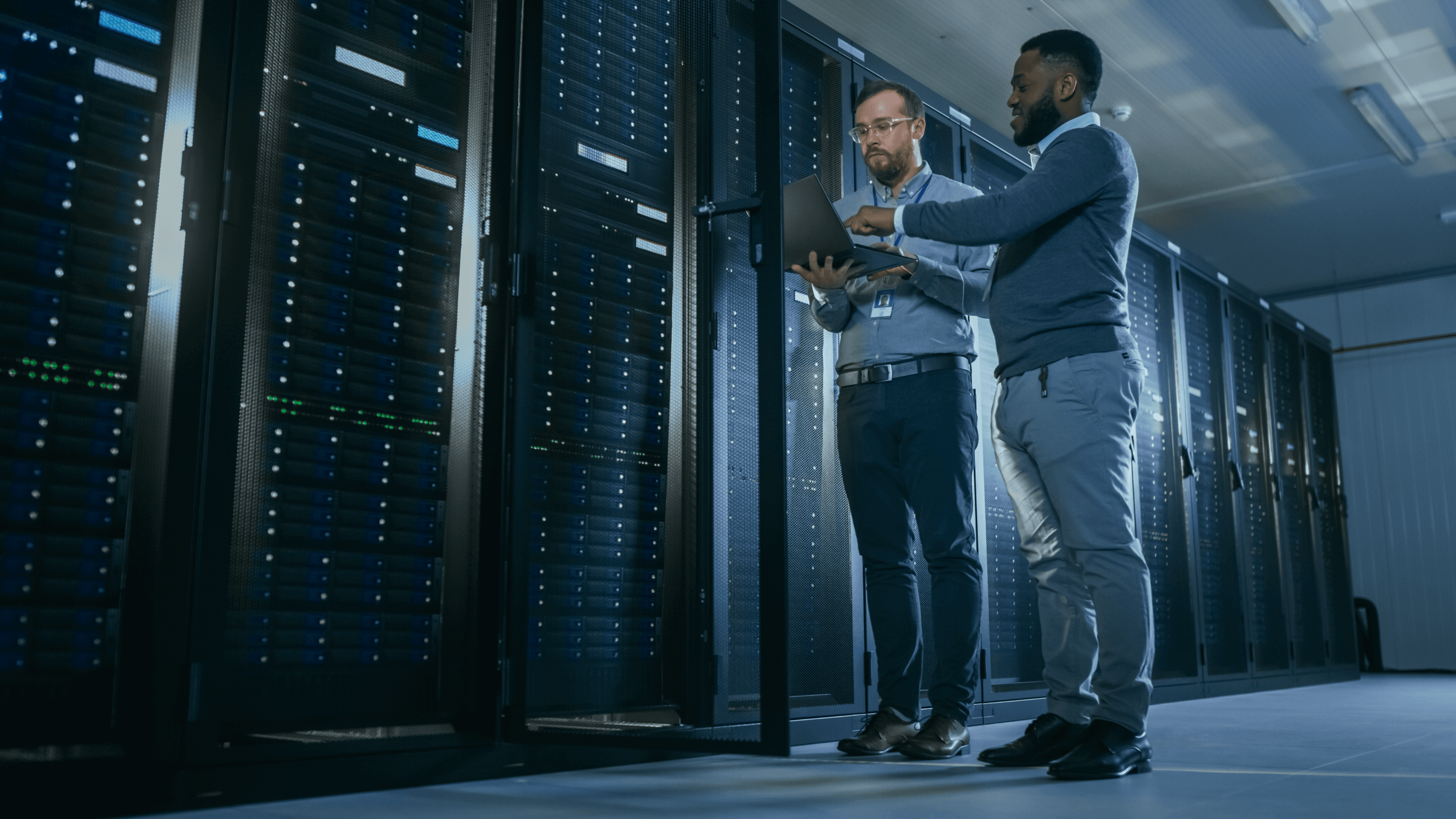 Data center IT engineers working on servers